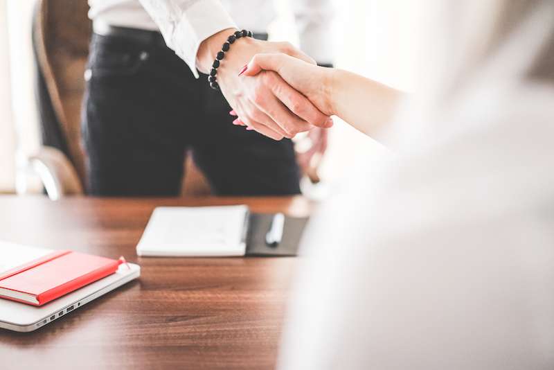 Business Man And Woman Handshake In Work Office Picjumbo Com